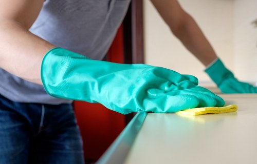 Local carpet cleaner in Catford preparing a carpet for treatment